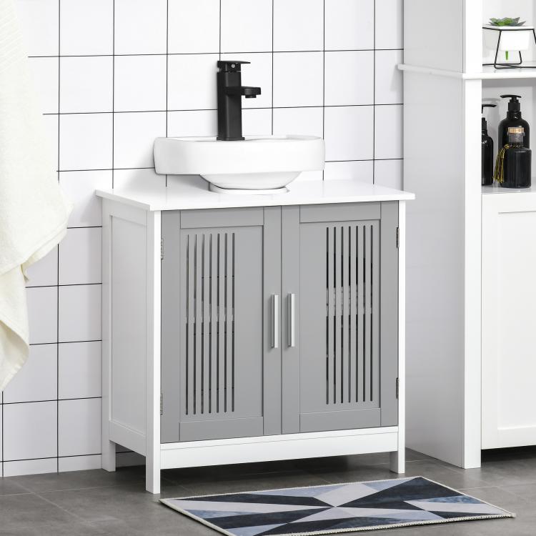 White bathroom vanity cabinet with grey slatted doors and countertop sink