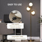Gold floor lamp with foot switch control and three white globe shades