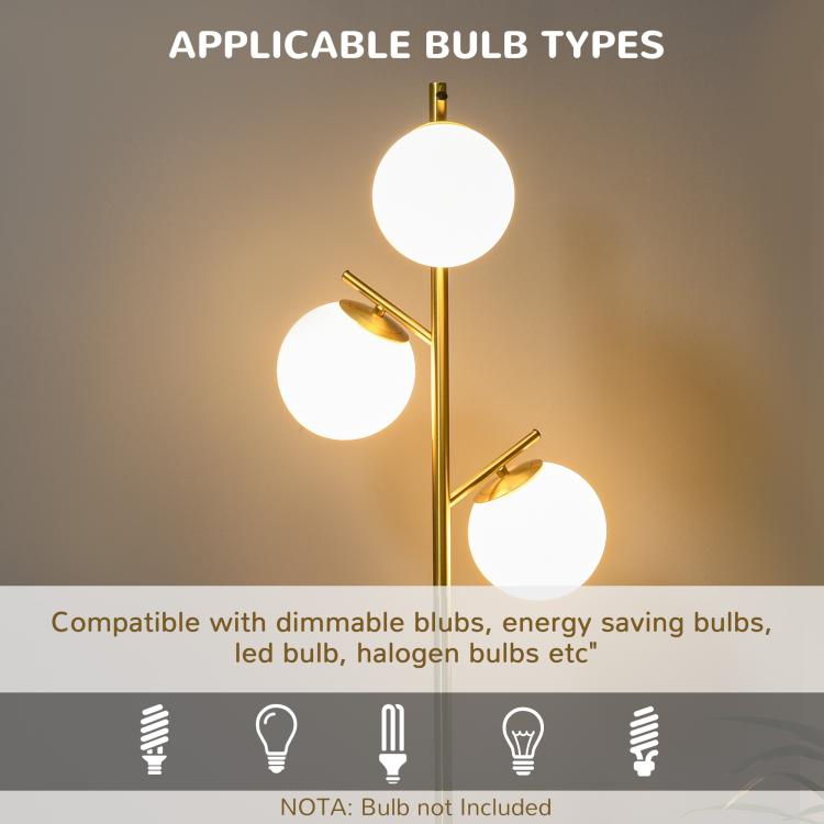 Gold floor lamp with three white globe shades for compatible bulb types
