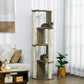 Cream-post cat tree with dark wood platforms; tabby cat perched on a middle level