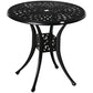 Black round cast-aluminum bistro table with lattice top and center umbrella hole