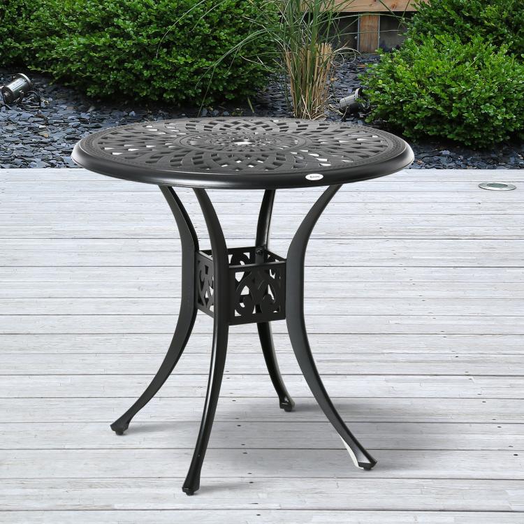 Black round outdoor bistro table with perforated top and ornate cutout pedestal legs