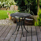 Black round patio bistro table with lattice tabletop and slender pedestal base