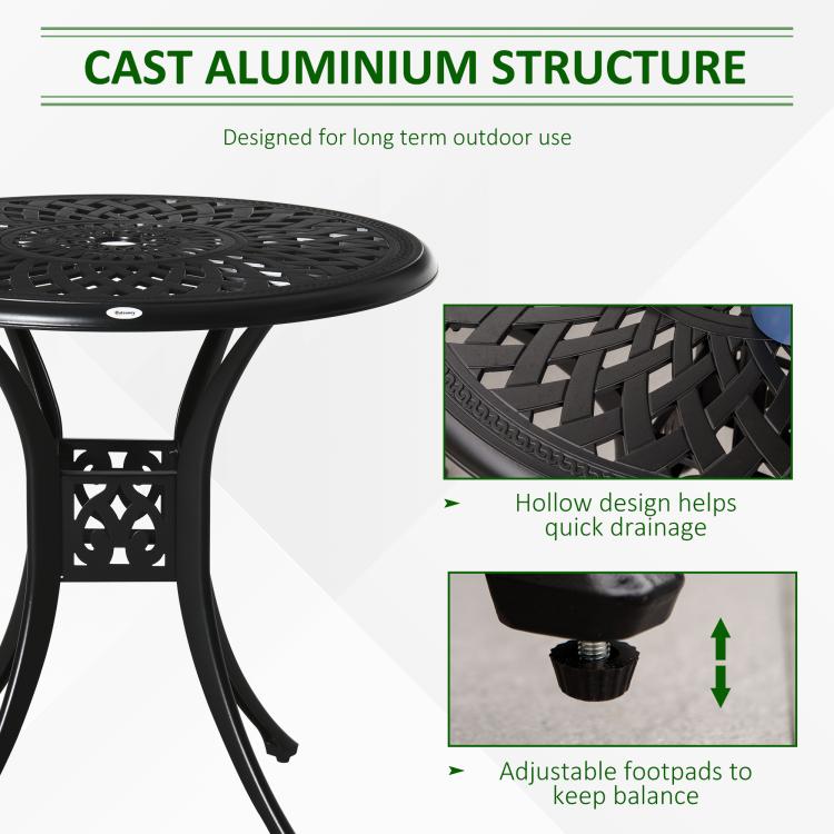 Black cast aluminum round table with hollow lattice design and adjustable footpads