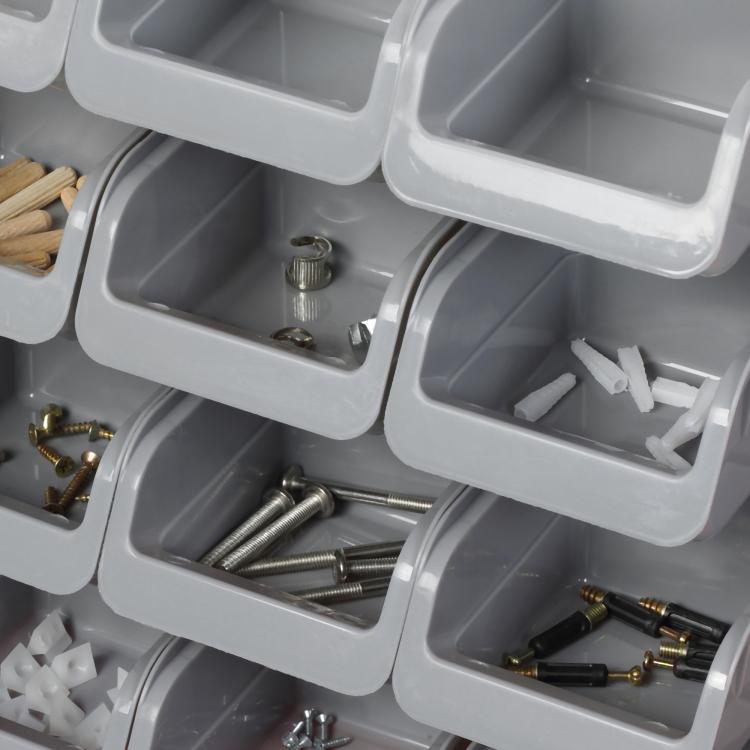 Gray pegboard organizer bins with screws and hooks, wall-mounted tool rack kit