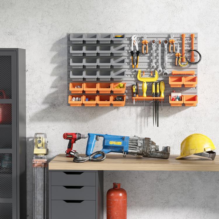 Wall pegboard tool organizer with gray bins, orange trays, and hanging hooks