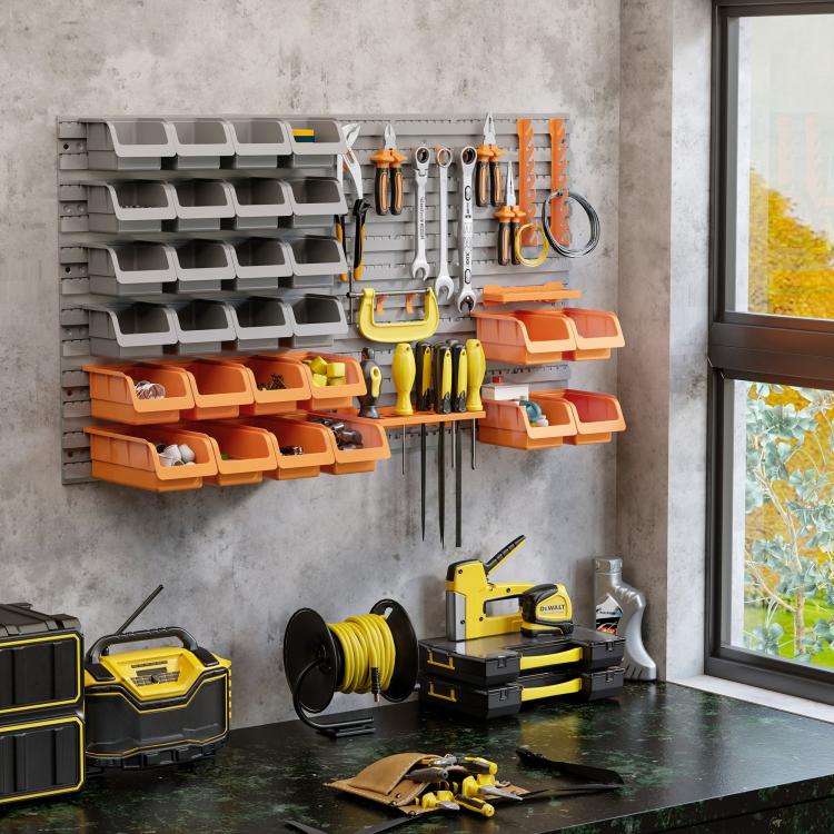Wall pegboard organizer kit with gray storage bins and orange accessory holders