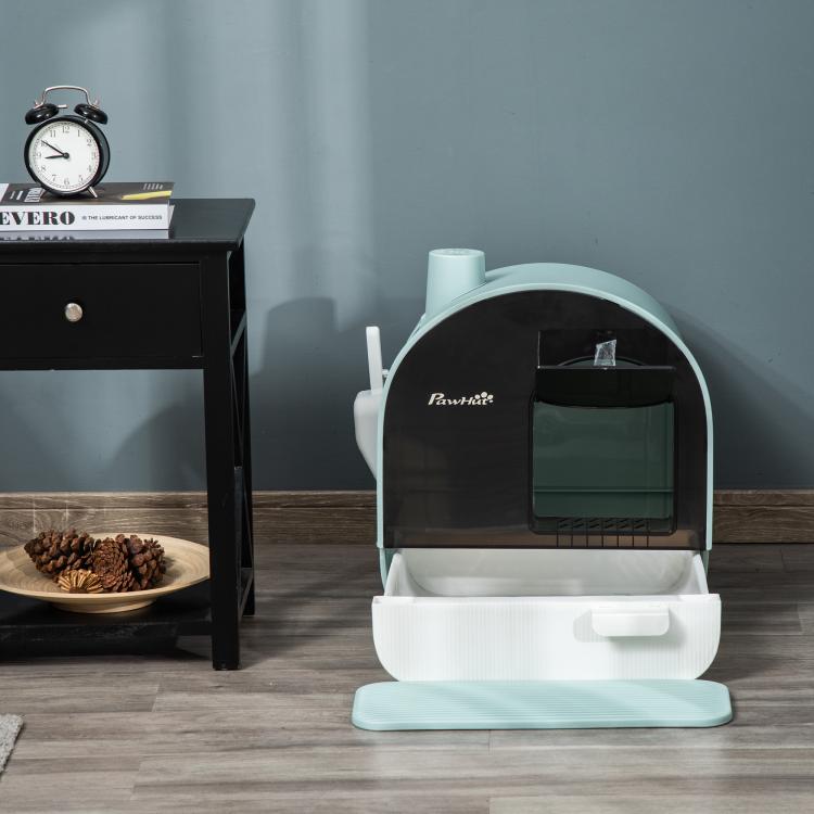 Covered cat litter box with lid and front drawer, white with dark front and teal mat