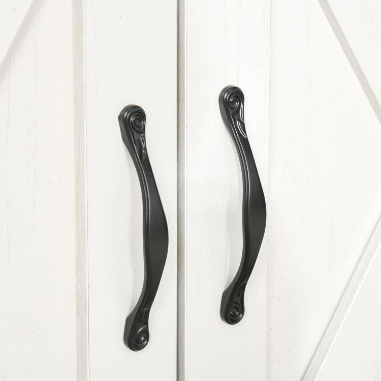 White cabinet door handle with curved black metal pull