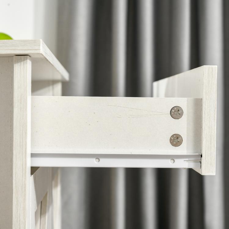 White sideboard interior showing shelf supports and metal mounting hardware