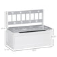 White toddler storage bench with gray star-patterned top and black lid support