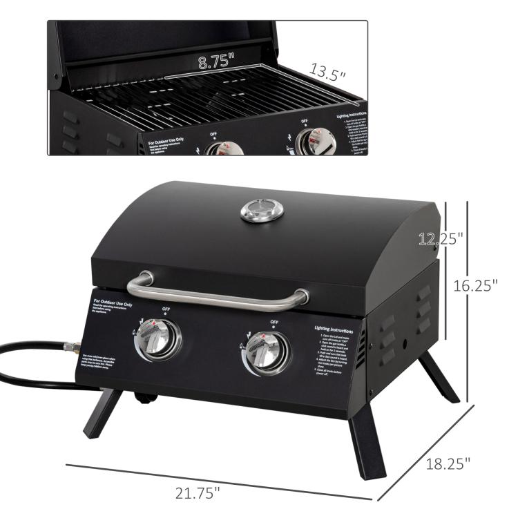 Black 2-burner tabletop gas grill with lid closed and front control knobs
