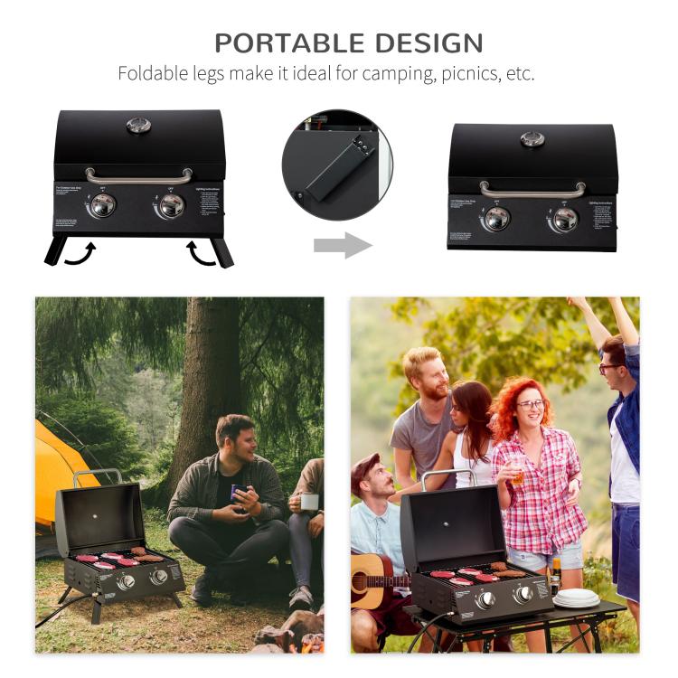 Black portable tabletop gas grill with closed lid and folding legs