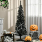 Black pencil artificial Christmas tree with spooky Halloween decor around it