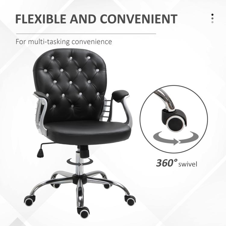 Black tufted swivel desk chair with 360-degree base and padded armrests