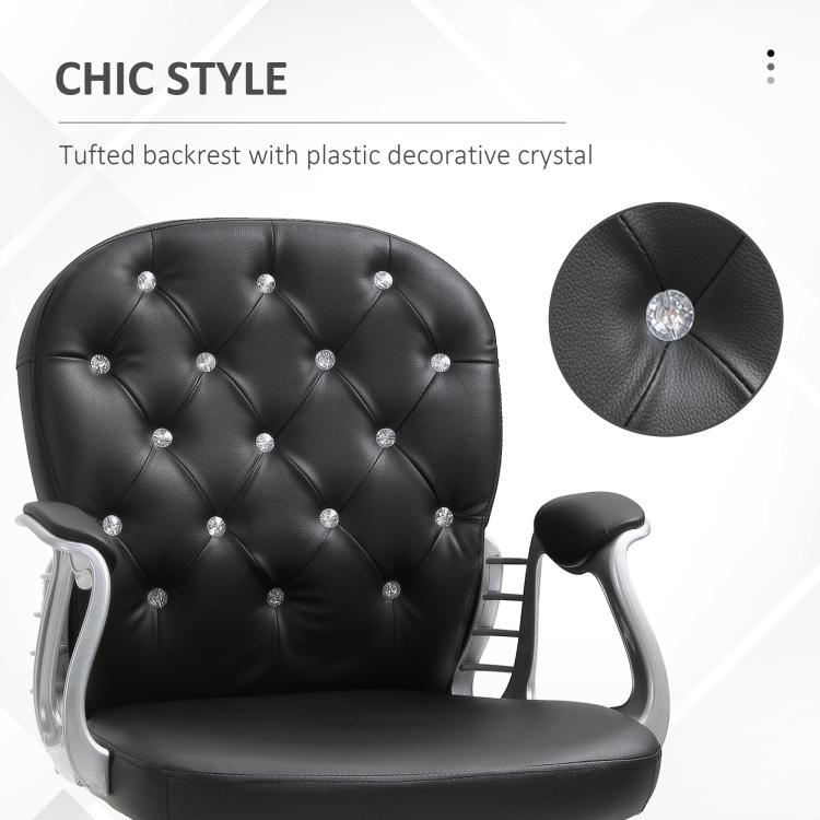 Black tufted backrest with crystal button accents, padded armrests, and chrome base
