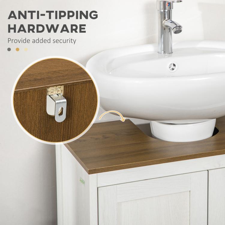 Bathroom sink cabinet with anti-tip hardware bracket under the dark wood countertop