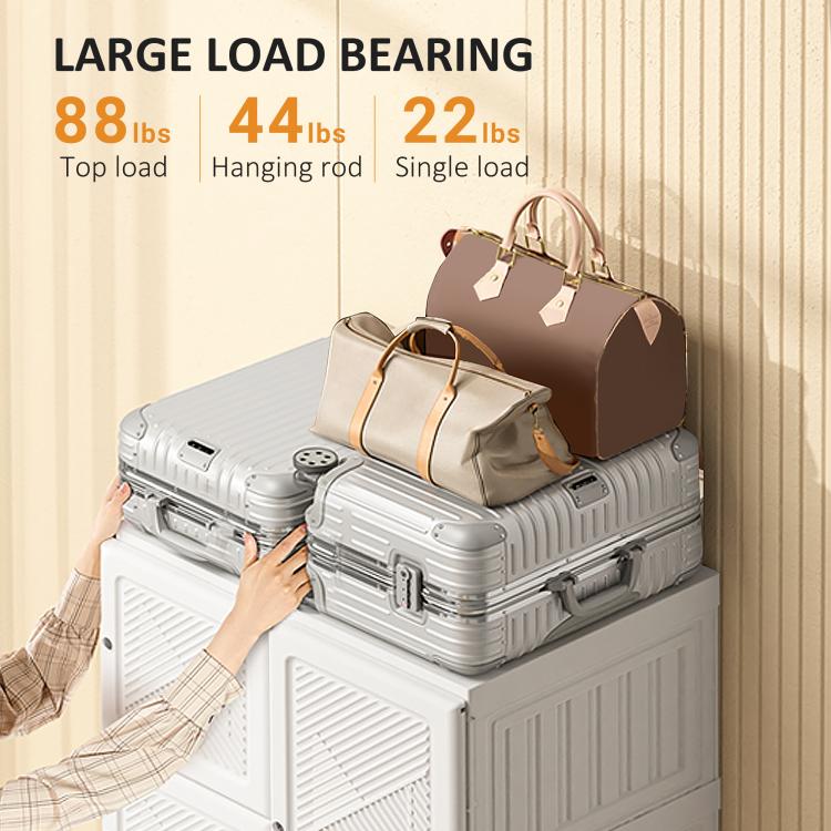 White folding wardrobe closet with luggage stored on top and cube doors below