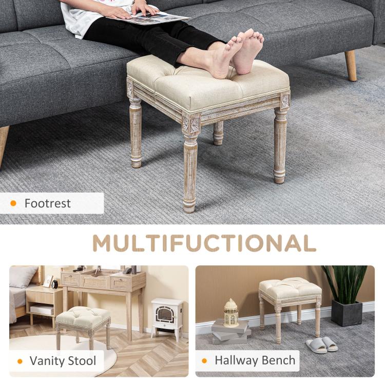 Beige linen-feel ottoman bench with button-tufted seat and carved wooden legs