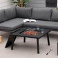 Black metal fire pit table with spark screen and flames in square bowl