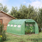 Green tunnel greenhouse with mesh window panels and zippered front door, outdoor yard
