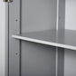 Adjustable interior shelf and side supports inside a gray bathroom cabinet