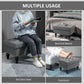 Gray storage ottoman used as extra seat, tufted lid, nailhead trim, turned legs