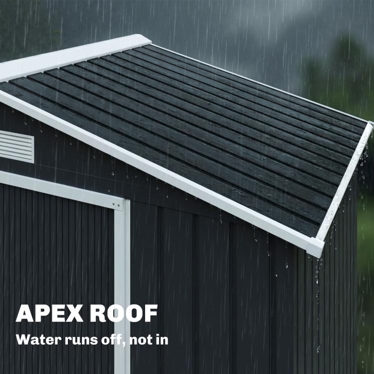 Dark gray storage shed with apex roof and extended eave for water runoff
