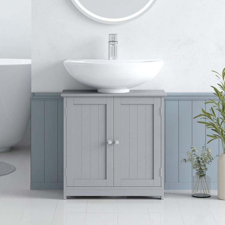 Gray bathroom vanity cabinet with double doors and ledge for a countertop sink