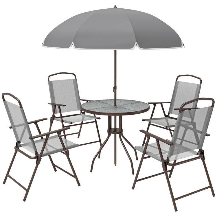 Outdoor patio dining set with gray umbrella canopy and four folding chairs, round table