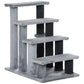 Gray cat tree with three step platforms, dark posts, and dangling ball