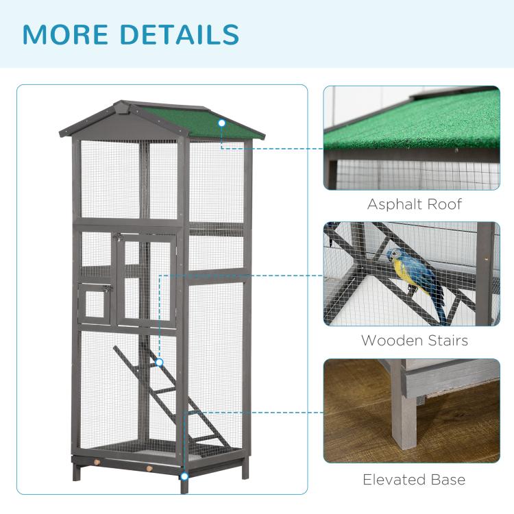 Grey wooden bird cage aviary with green roof, elevated base, and interior wooden stairs