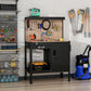 Black tool workbench with tan pegboard, drawer, and enclosed storage cabinet