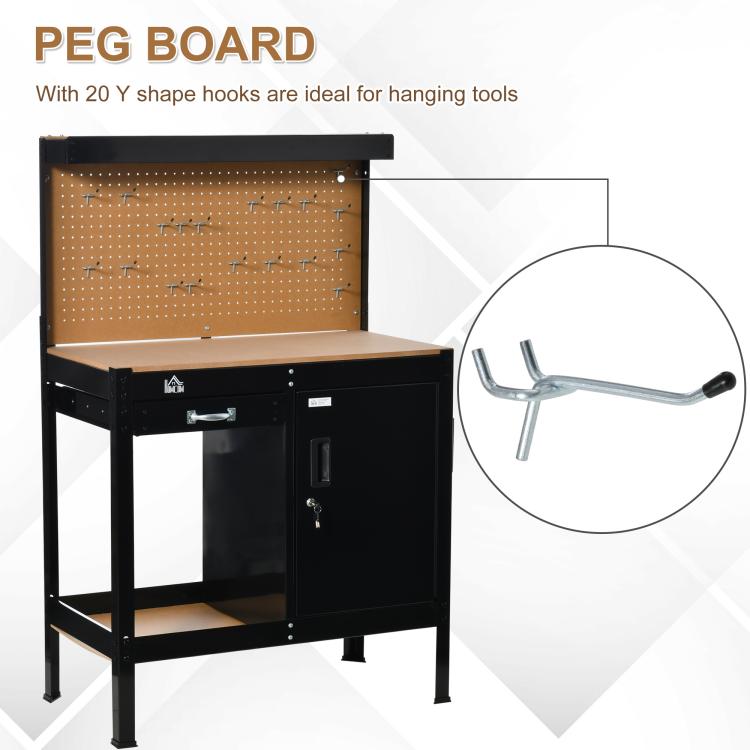 Black workbench with tan pegboard for hanging tools and a slide drawer