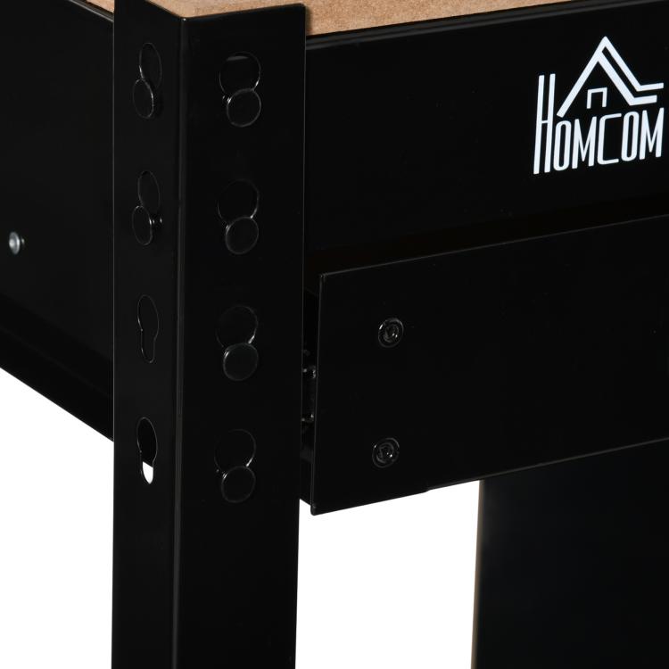 Black metal workbench corner panel and leg detail with perforated holes