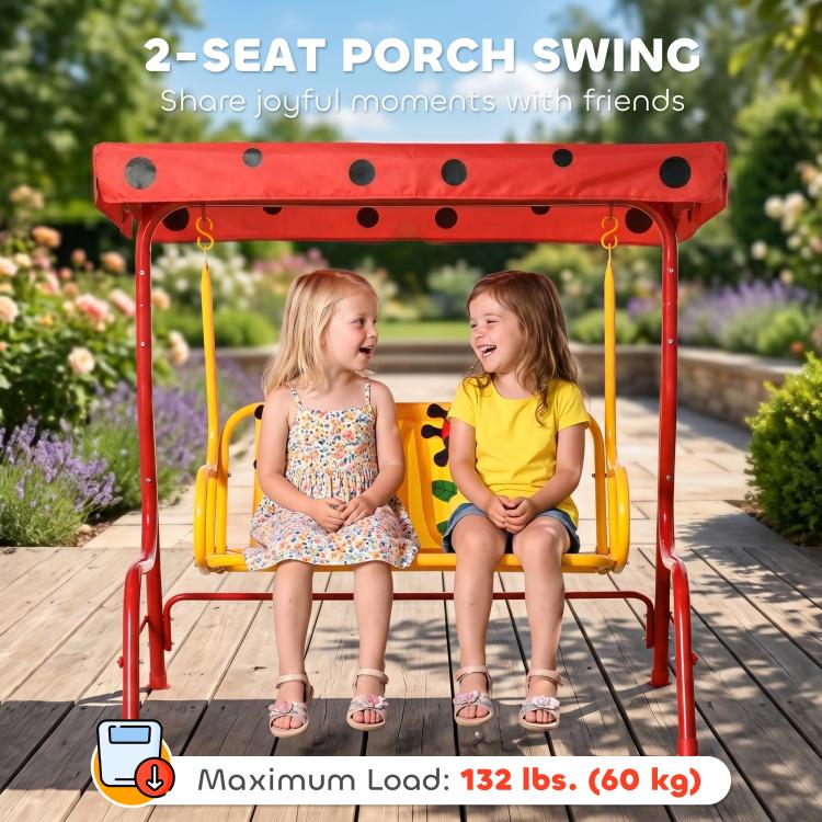 Red 2-seat porch swing with ladybug seat backs and canopy, with two children seated