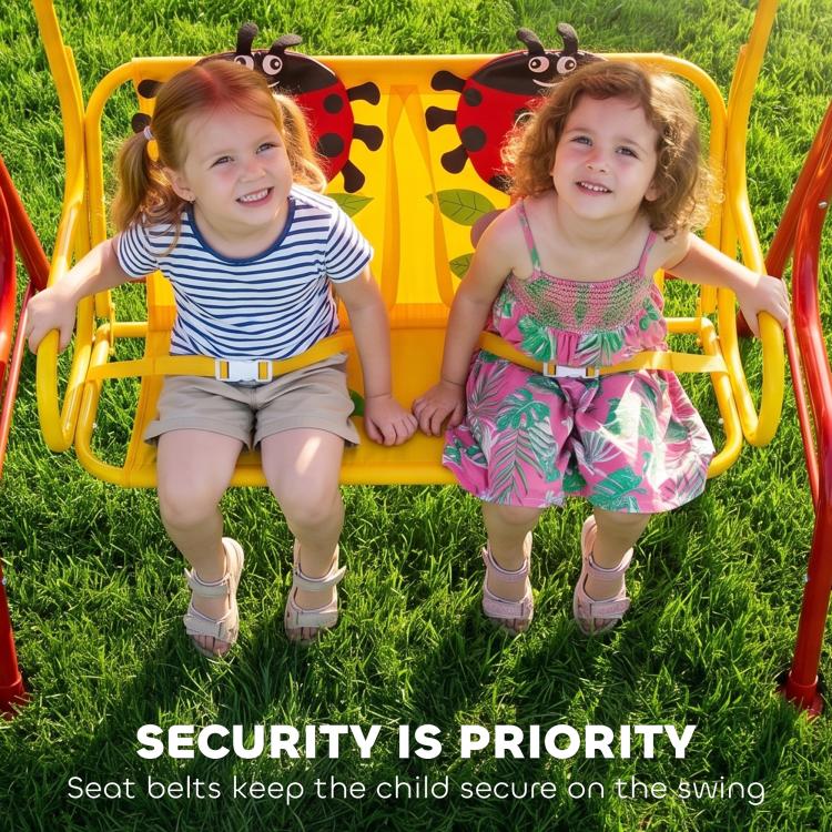 Two kids on red 2-seat swing with ladybug seat cushions and safety seat belts