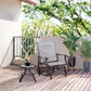 Gray outdoor glider chair on patio with tall backrest and mesh seat