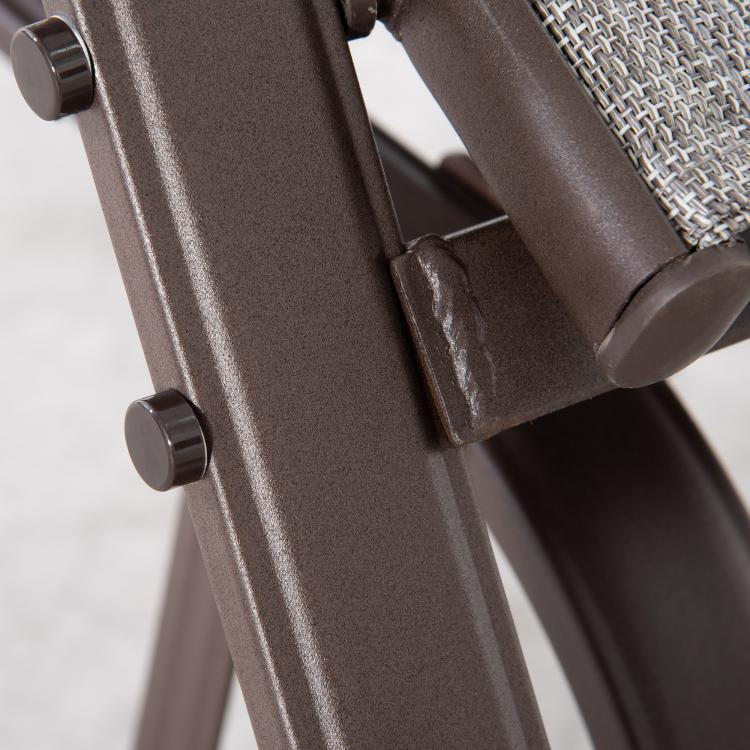 Close-up of gray mesh glider chair frame joint with curved rocking bar