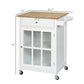 White rolling kitchen island cart with glass door cabinet and drawer, wooden top, 27 in