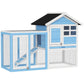 Light blue wooden rabbit hutch with black roof, wire run, and access door