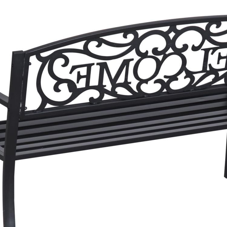 Black metal bench backrest close-up with "WELCOME" vine cutout design.