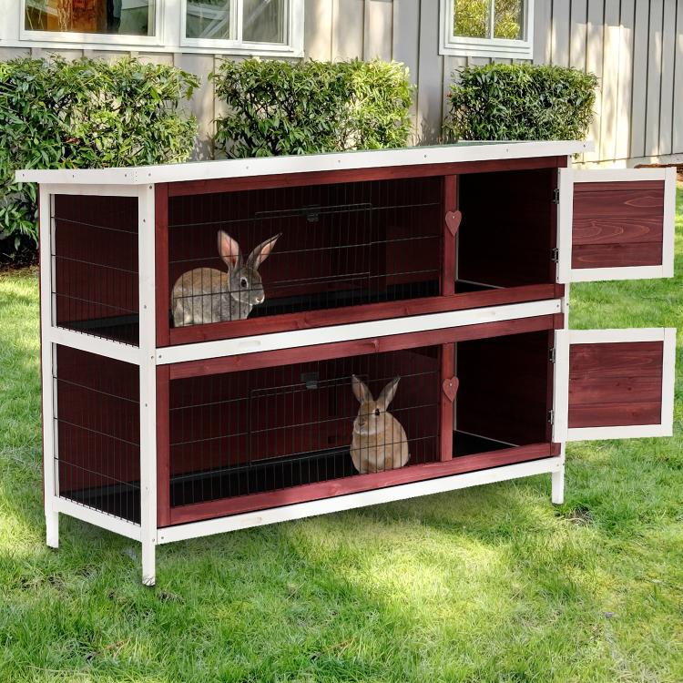 Outdoor two-level wooden rabbit hutch with wire mesh, open doors, and rabbits inside