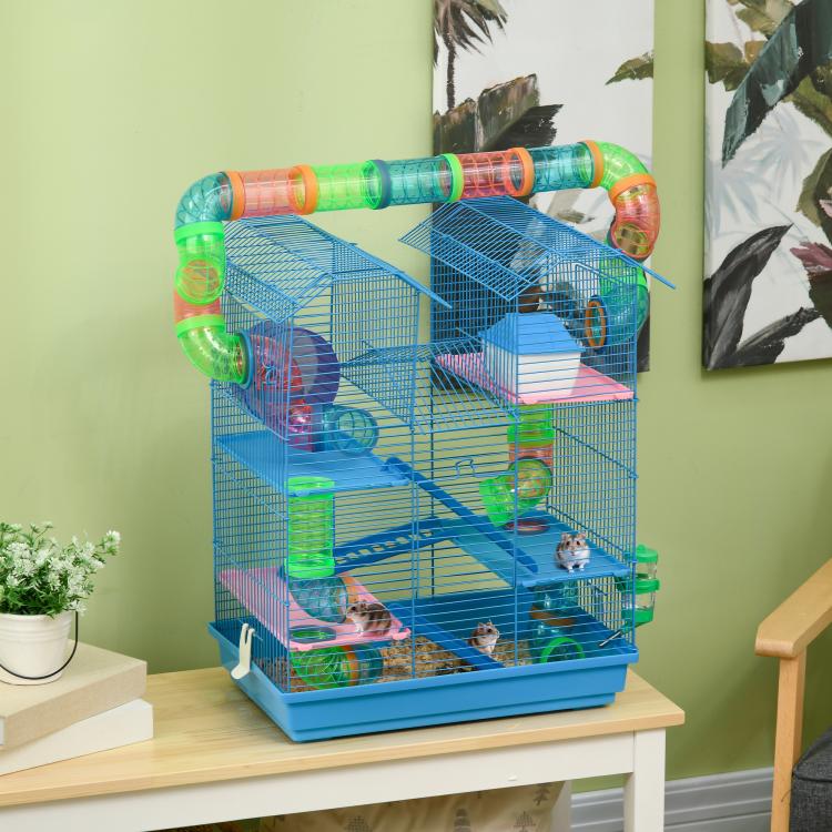 Blue 5-tier rodent cage with tubes, ramps, and colorful hideouts on multiple levels