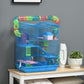 Blue hamster cage set with tunnels and a small pet on the inner platforms