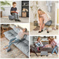 Gray cube ottoman foot rest shown in use, with fabric top and black legs