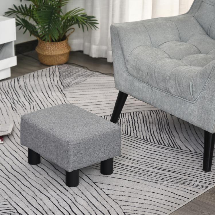 Gray square ottoman foot stool with padded top and black plastic legs