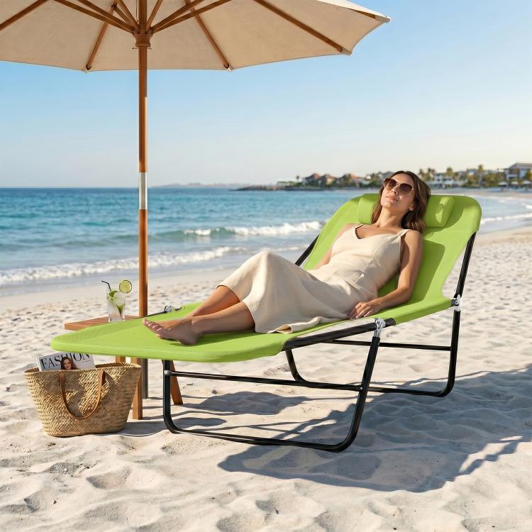 Green folding chaise lounge chair with reclining back and black metal frame