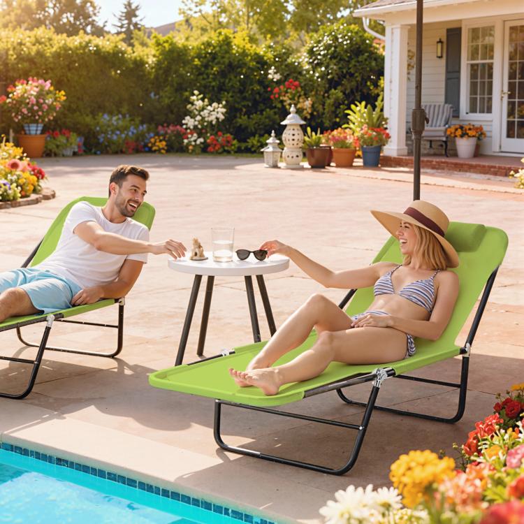 Green reclining chaise lounge chair with black frame for outdoor relaxation