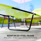 Close-up of reinforced black steel frame on green folding chaise lounge chair